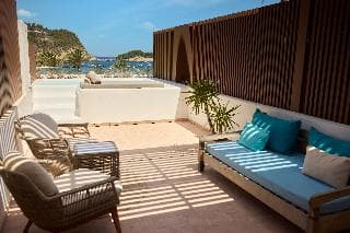 Cala San Miguel Ibiza Res, Curio Colllec by Hilton - Image 1